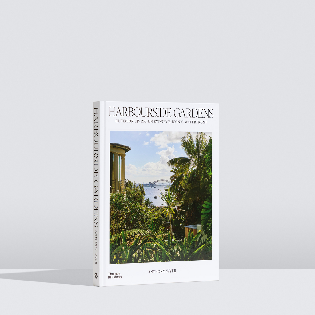 Book titled 'Harbourside Gardens' with a scenic cover on a white background