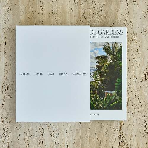 Book titled 'Gardens' with a cover image of a garden on a textured beige surface
